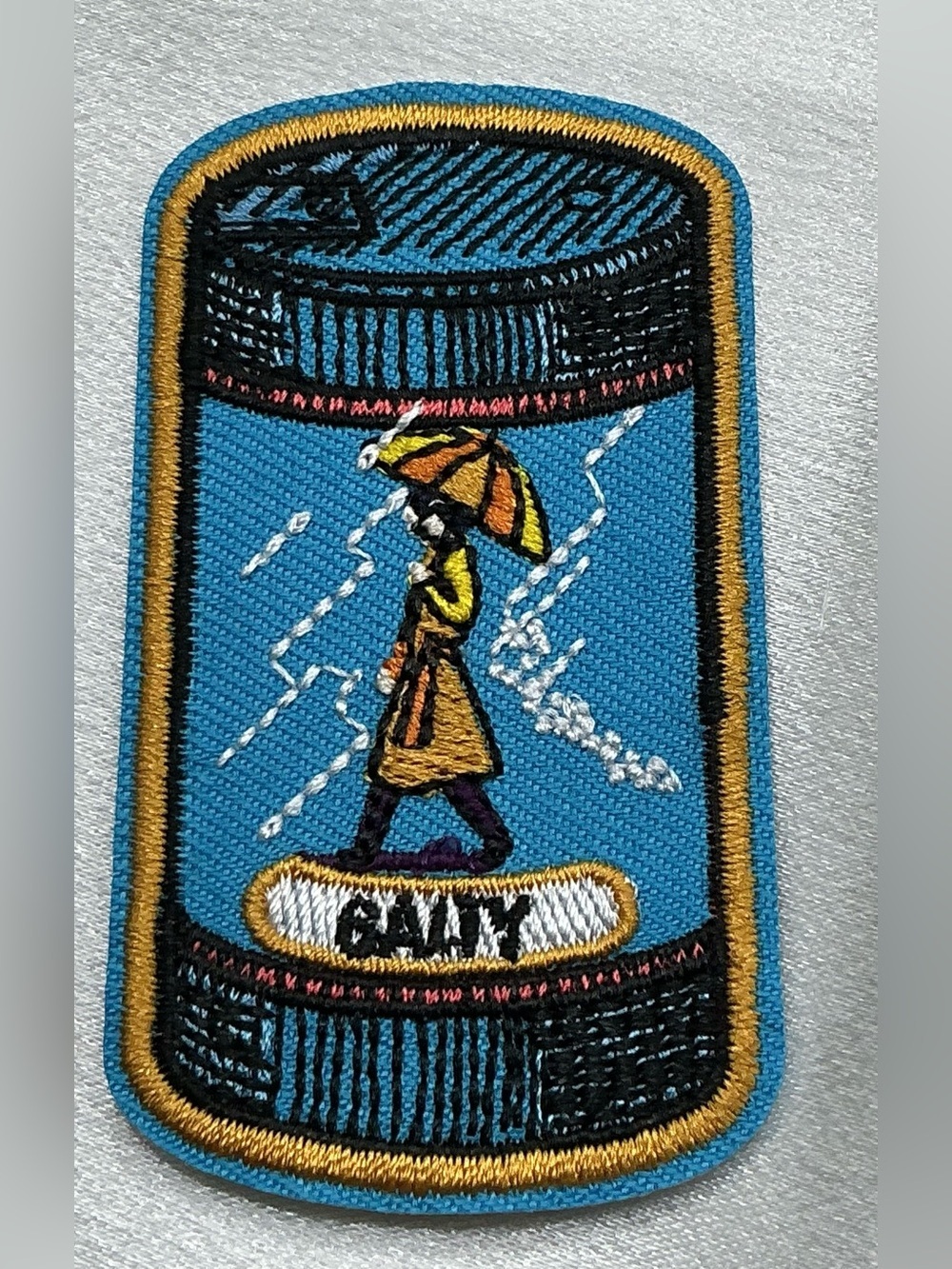 EMBROIDERED IRON OR SEW ON PATCH SALTY SALT SHAKER UMBRELLA LADY